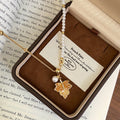 Pearl Strand Necklace With Gold Tone Maple Leaf Pendant view 6