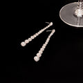Silver Tone Graduated Clear Stone Long Stud Earrings view 4