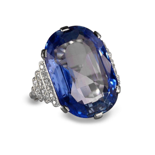 Second product view showing silver-tone oversized deep-blue oval solitaire statement ring