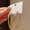 Gold Tone Slender Angular Bamboo Style Hoop Earrings view 2