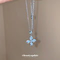 Silver Tone Four Petal Flower Crystal Pendant Necklace view 1