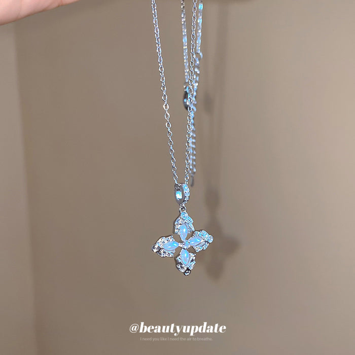 Silver Tone Four Petal Flower Crystal Pendant Necklace
