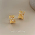 Gold Ribbed Geometric Half-Hoop Stud Earrings Pair view 1