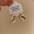 Gold Tone Textured Fan Twist Stud Earrings with Crystals view 4