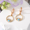 Gold Tone Crystal Hamsa and Evil Eye Huggie Drop Earrings view 4