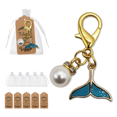 Teal mermaid tail and pearl keychain with packaging