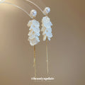 White Petal Cluster Drop Earrings with Long Gold Tone Tassels view 2