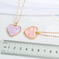 Gold Tone Pearlescent Heart Pendant Necklaces in Pink and Purple view 3