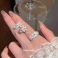 Silver Daisy Flower Stud Earrings and Open Ring Set view 2
