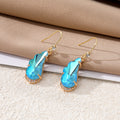 Gold Tone Faceted Wing Crystal Effect Hook Earrings in Four Colors view 3