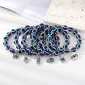 Silver Tone Blue Evil Eye Bead Stretch Bracelets with Six Charms view 2