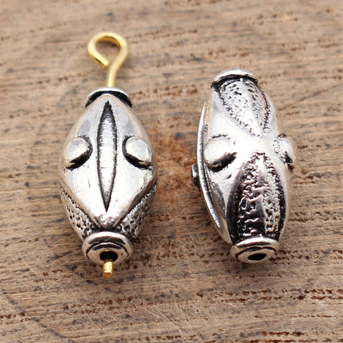 Angled display of the raised oval bead