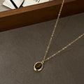 Gold Tone Layered Necklace with Brown Oval Pendant view 2