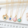 Gold Tone Hamsa and Heart Evil Eye Pendant Necklaces in Three Designs view 4