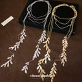 Silver Tone Layered Leaf Tassel Necklace With Decorative Metal Details view 2