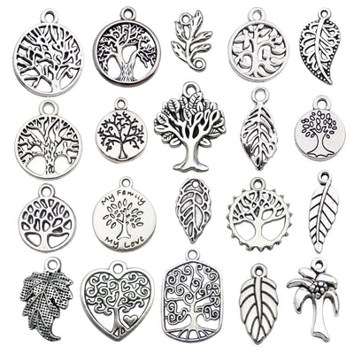 Antique silver leaf beads arranged on a light background