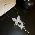 White Butterfly Drop Earrings And Gold Butterfly Necklace view 6