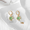 Gold Tone Faceted Crystal Heart Huggie Earrings in Eleven Color Options view 4