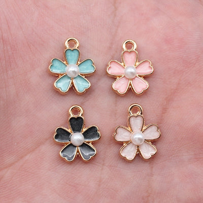 Hand held view of flower charms