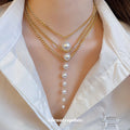 Gold Layered Pearl Drop Necklace with Graduated Chain Strands view 3