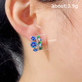 Silver Tone Blue Flower Green Leaf Huggie Earrings view 5