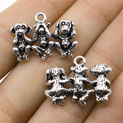 Three Wise Monkeys Charm shown in close view