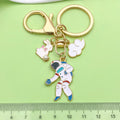 Gold-Tone Space Metal Keychains with Astronaut and Rocket Charms view 4