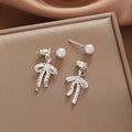 Silver Bow Pearl Look Open Ribbon Dangle Stud Earrings view 6
