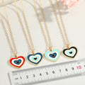 Gold Tone Layered Heart Evil Eye Pendant Necklaces in Four Colors view 2