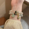 Four Mixed Beaded Bracelet Designs With Butterfly Fruit And Pod Charms view 4