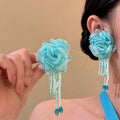 Ivory Fabric Flower Beaded Earrings With Polished Metal Tone Details view 3