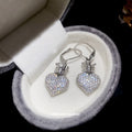 Silver Tone Crystal Heart Drop Huggie Earrings With Crown Detail view 2