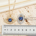 Large Almond Crystal Halo Blue Evil Eye Pendant Necklaces in Two Finishes view 5