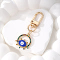 Gold Tone Rhinestone Round Evil Eye Clip Keychains in Six Colors view 6