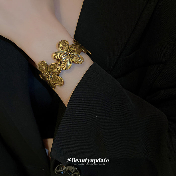 Antique Gold Tone Floral Relief Wide Open Cuff Bracelet