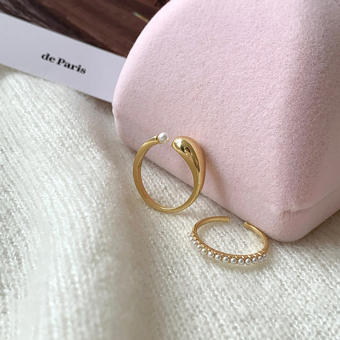 Two Piece Gold Tone Open Ring Set With Plain And Crystal Bands