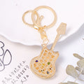 Rhinestone Guitar Keychain Cat Eye Beads Gold Clasp 3 Colors view 4