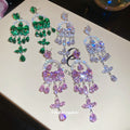 Heart Crystal Teardrop Chandelier Stud Earrings with Polished Metal Details view 1
