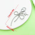 Butterfly Charm Keychains Featuring Silver Bow Across 8 Pictured Variations view 6