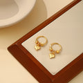Gold Tone Hoop Double Heart Charm Small Huggie Earrings view 2
