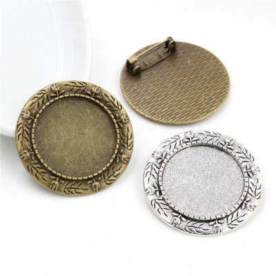 Front view of leaf wreath brooch bezel blank finish options