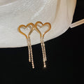 Gold Tone Open Heart Chain Tassel Earrings in Two Sizes view 7