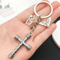 Striped Black and Bone Cross Skull Bat Keychains with Metal Hardware view 3
