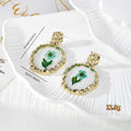 Gold Tone Round Birth-Flower Pressed Botanical Drop Earrings in Nineteen Designs view 3