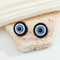 Round Blue Evil Eye Stud Earrings with Six Colored Metal Rims view 4