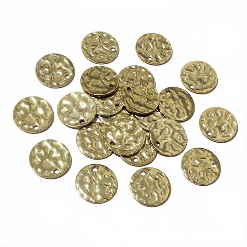 round metal disc with a hammered surface close view of the front surface and finish