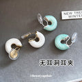Two Tone Curved Clip On Earrings with Enamel Inlays view 1