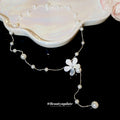 White Flower Beaded Necklace with Pearl-Look Strands view 2