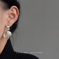 Gold Tone Clear Stone Bar And Translucent White Petal Stud Earrings view 2