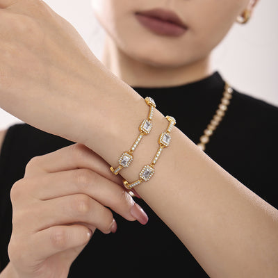 Gold rectangle halo zircon link bracelet worn on wrist double loop